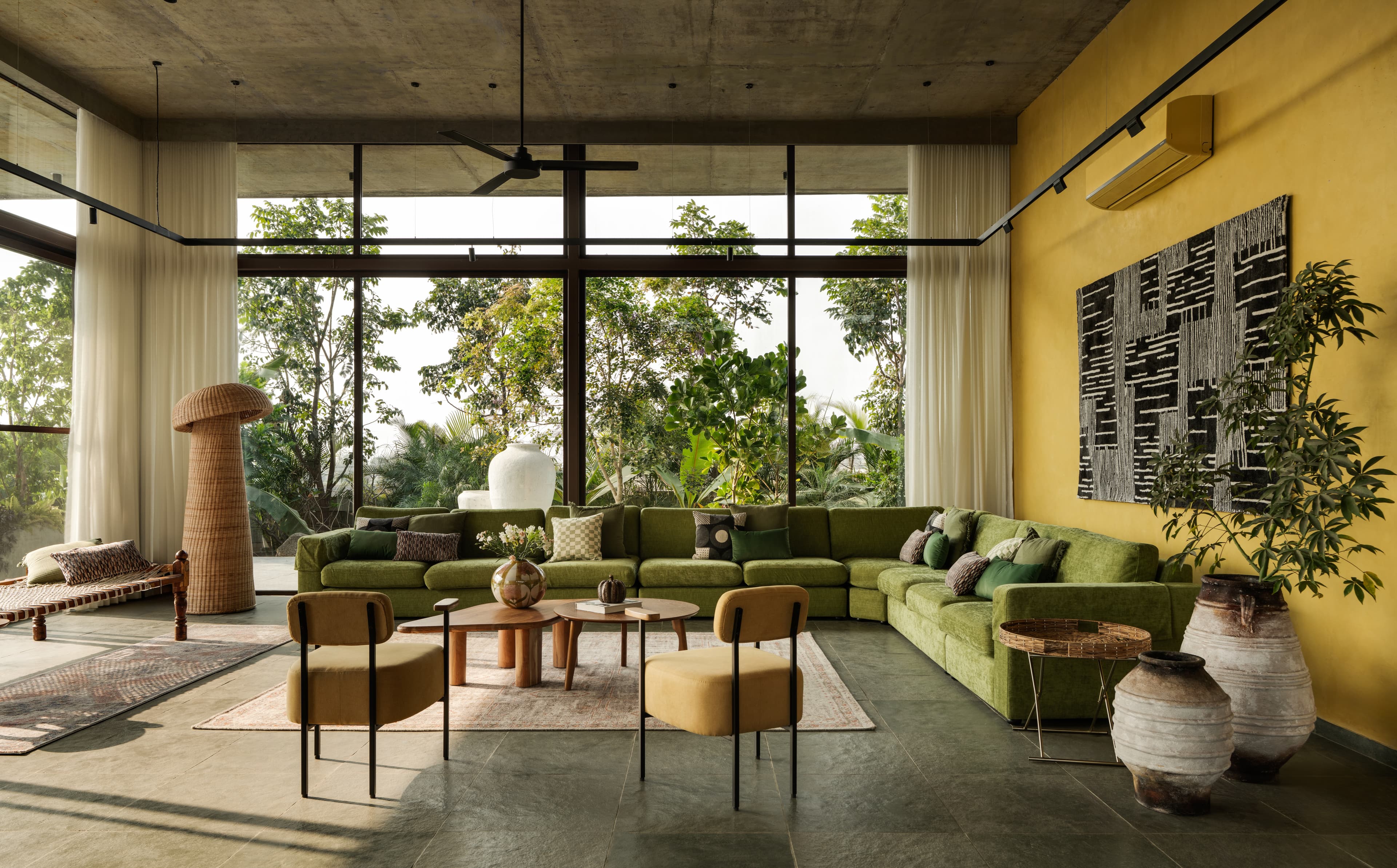 The living room at SAHN opens fully to the courtyard.